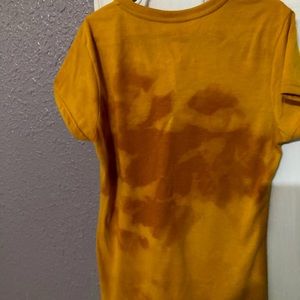 It’s a size xs. It’s bleached and sublimation design.